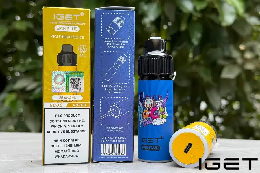 IGET-Bar-Plus-Pod-System-1webp - Oz Vapor Store Vape starter kit: yellow and blue cartridge boxes beside a blue IGET Bar Plus vape bottle with cartoon art.